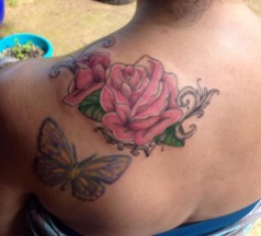 custom rose tattoo and re-add color to existing butterfly tattoo